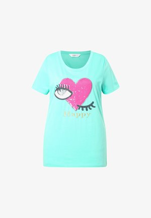 T-shirt verde menta a maniche corte con una grafica a forma di cuore in paillettes rosa, un occhio e la parola "Happy" in oro sottostante. Materiale in cotone morbido.