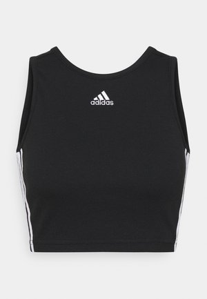 Black athletic crop top made of ribbed fabric, featuring a round neckline, white adidas logo, and white side stripes along the edges.