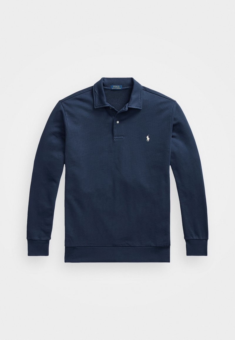 Tumed sinine pikkade varrukatega polo särk pehmest puuvilla segust. Omab klassikalist kraed, kahte nupuvajutust ja tikanditud logo rinnal.
