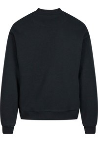 Sweat-shirt noir à manches longues avec col rond, poignets et ourlet côtelés, montré de dos sur fond blanc.