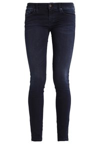 Dark blue skinny jeans made of denim. Features a front button closure, standard pockets, and slight fading on the thighs.