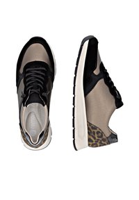 Sneakers with black suede and smooth beige leather, featuring a leopard print accent. Thick white sole, lace-up front, and padded collar.