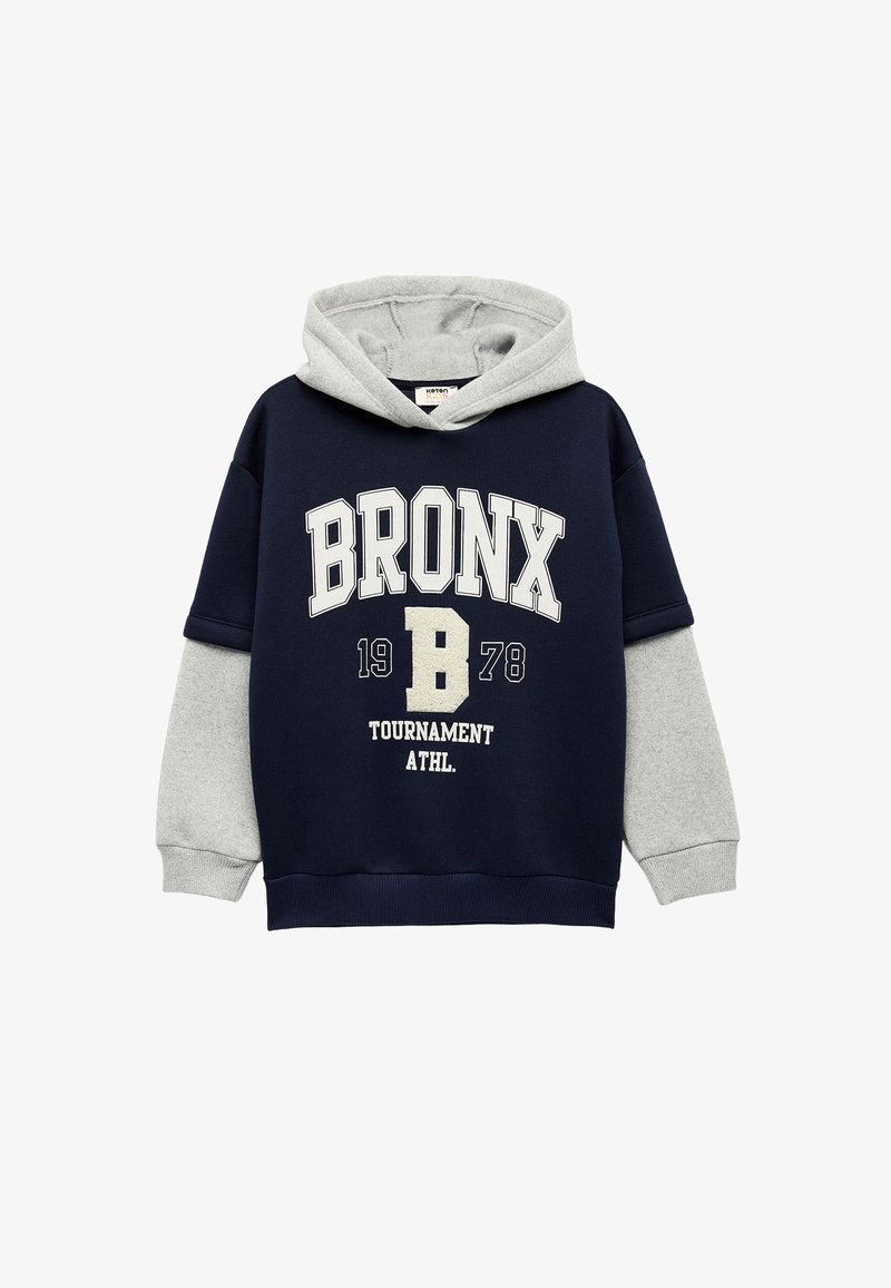Sudadera en azul marino y gris con un bolsillo tipo canguro, que presenta "BRONX 1978" en grandes letras blancas y mangas grises. Tejido mezcla de algodón.