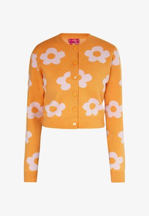 Cardigan giallo con motivi floreali bianchi, maniche lunghe, scollatura a girocollo e bottoni arancioni davanti. Texture morbida a maglia.