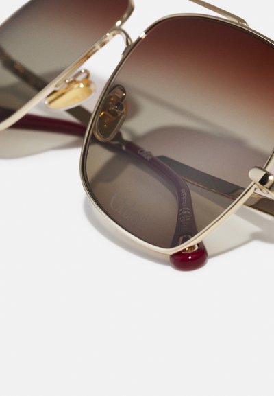 CHLOÉ CH0278S - Ochelari de soare - gold-coloured/brown