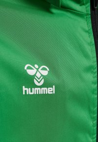 Hummel HMLCORE XK SPRAY - Outdoorová bunda - jelly bean