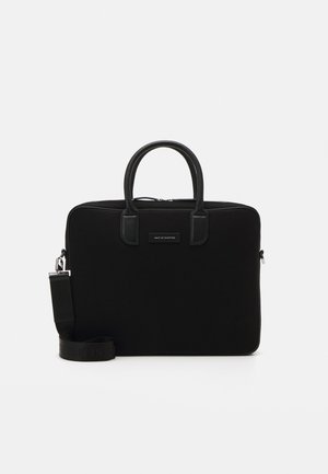 Black laptop bag with a smooth texture, dual handles, a detachable strap, and a simple rectangular design. Features a front logo plate.