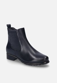 Navy leather ankle boot with elastic side panel, rounded toe, and low block heel. Smooth finish with textured accent.