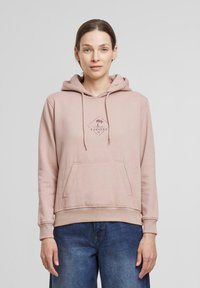 Hanorac roz deschis cu șnur, buzunar tip kangaroo și un logo în formă de diamant cu palmieri. Material din bumbac fin și ușor.
