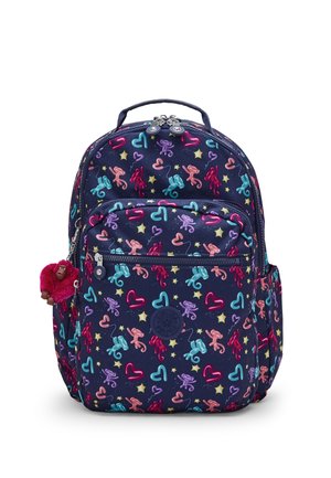 Zaino blu navy con motivi colorati di animali di palloncini e cuori, tasca frontale con cerniera, tasche laterali e portachiavi con scimmietta di peluche rossa.