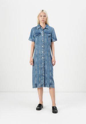 Denim shirt dress with a collared neckline, short sleeves, front button closure, two chest pockets, and a mid-length hem.