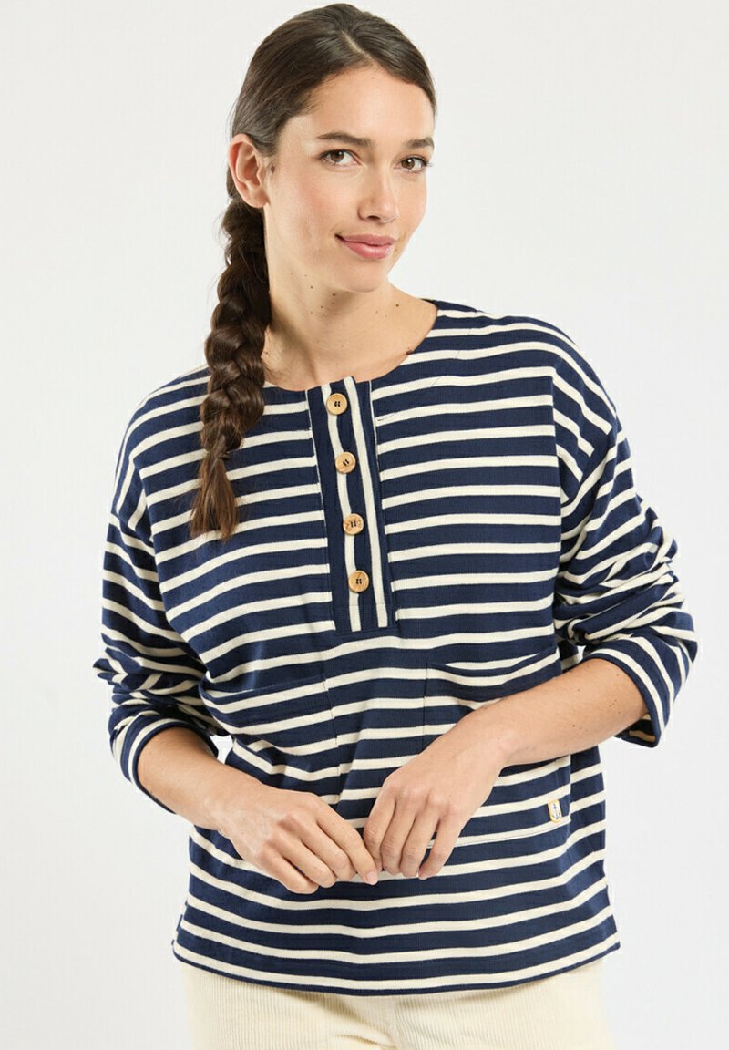 Navy and cream striped cotton top with a round neckline, three wooden buttons, long sleeves, and a pocket on the front.