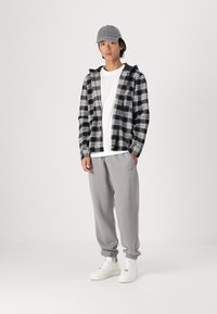 Hollister Co. Relaxed Fleece Logo Joggers - Trainingsbroek - grey