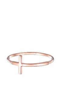 Roségoldene Armreife mit einem Kreuzdesign, das eine glatte, polierte Oberfläche und ein dünnes, kreisförmiges Band aufweist.