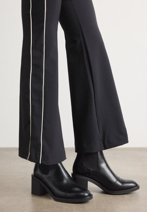 NALIE - Ankelboots med høye hæler - black