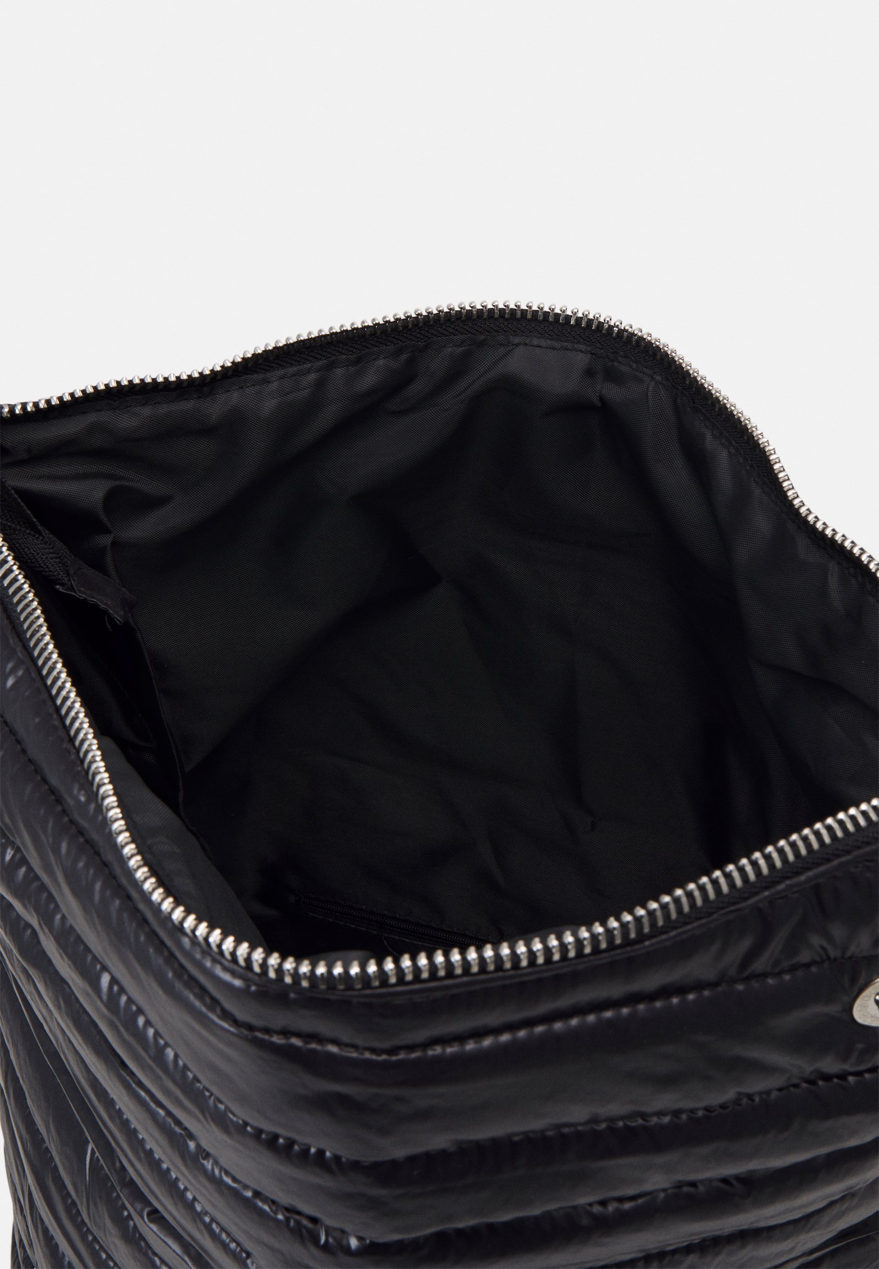 leather foldover backpack