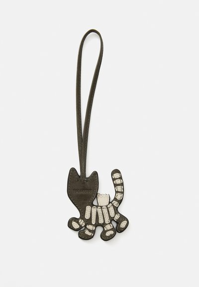 Leather cat-shaped keychain with a dark brown base and light gray accents. Features a tail and paws, with distinct stitched details.