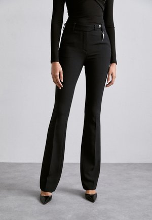 Roberto Cavalli PANTS - Housut - nero