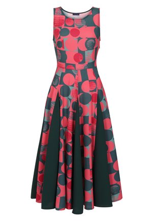 Robe sans manches colorée avec un col rond, ornée de cercles rouges, verts et bleus. La jupe est plissée et descend en dessous des genoux.