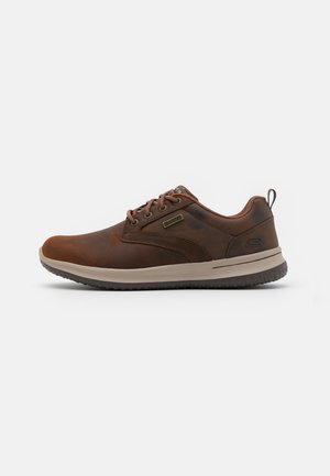 Mareo ansiedad Comenzar Descubre los modelos de Skechers para hombre | Online en ZALANDO