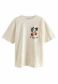 Kreemi värvi puuvillane t-särk, millel on kujutis punastest tomatitest ja rohelisest lehestikust, alltekstiga "la dolce vita".