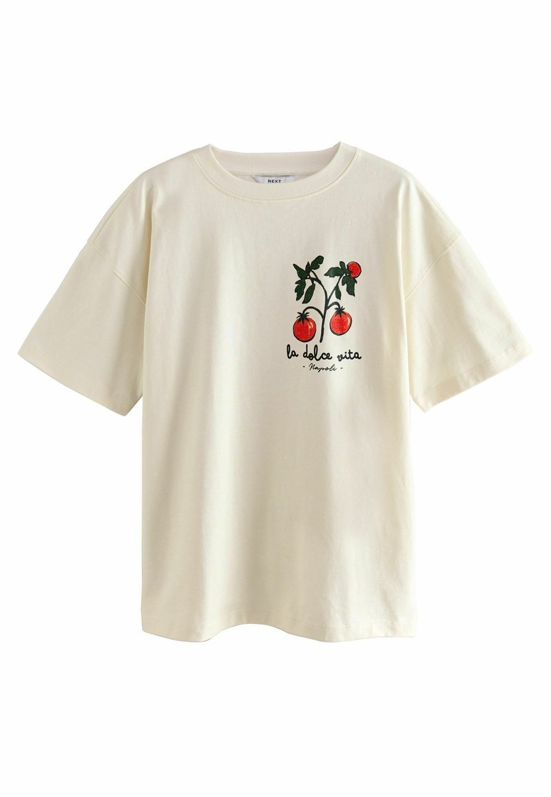 Cream-colored cotton t-shirt featuring a graphic of red tomatoes and green leaves, with the text "la dolce vita" printed below.
