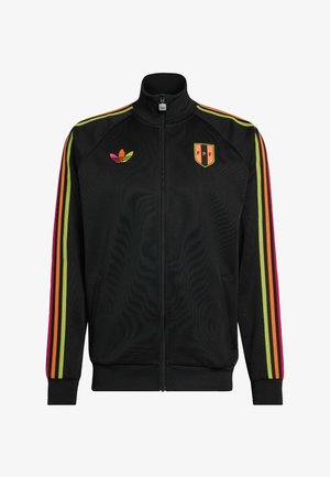 Veste noire à fermeture éclair intégrale avec des rayures arc-en-ciel sur les manches, un logo trèfle multicolore sur la poitrine gauche et un écusson orange "FPF" sur la poitrine droite.