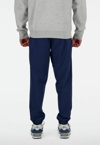 New Balance ATHLETICS JOGGER - Treningo apatinė dalis - nb navy