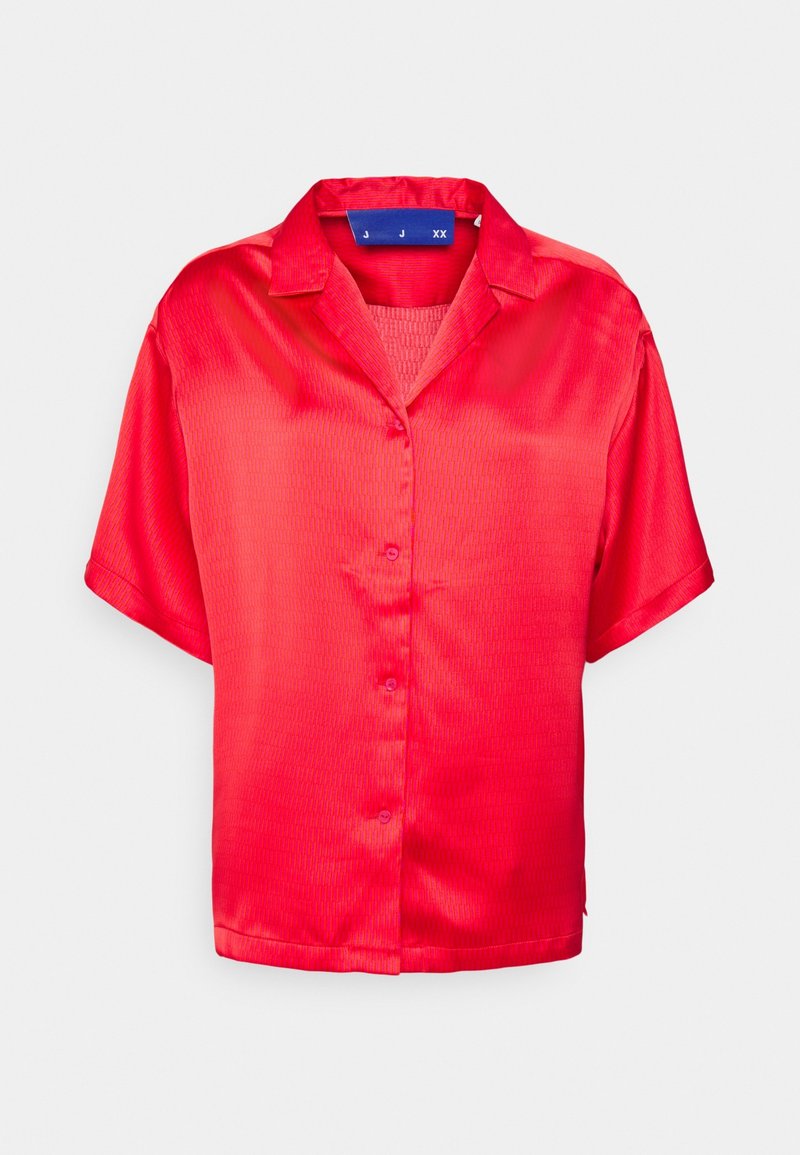 Bright red short-sleeve button-up shirt with a textured pattern and open collar, displayed against a white background.