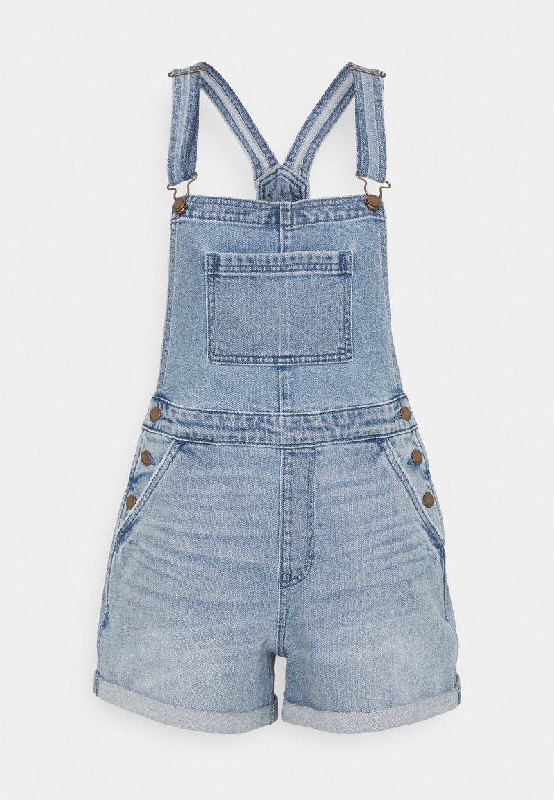 Vaaleansiniset farkkuhaalarit, joissa on säädettävät hihnat, etutasku ja kolme pronssista nappikoristetta sivuilla. Sisältää lyhyet, käärityt lahkeet.