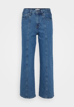 Blå højtaljede wide-leg jeans med en falmet finish, der har fremtrædende front sømme og fem-lomme design, lavet af denimstof.