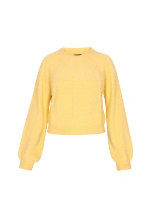 Keltainen lyhyt neulepusero pehmeästä materiaalista, pitkät hihat, jossa on teksturoitu pinta ja koristeltuna pienillä valkoisilla helmillä.