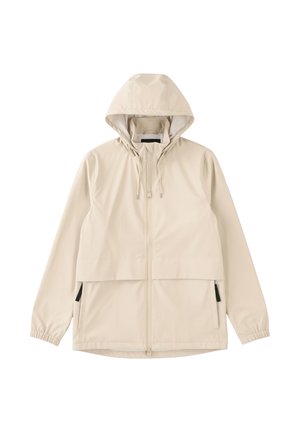 Veste légère beige avec capuche, poignets élastiques, fermeture éclair frontale et deux grandes poches. Texture lisse, design minimaliste.