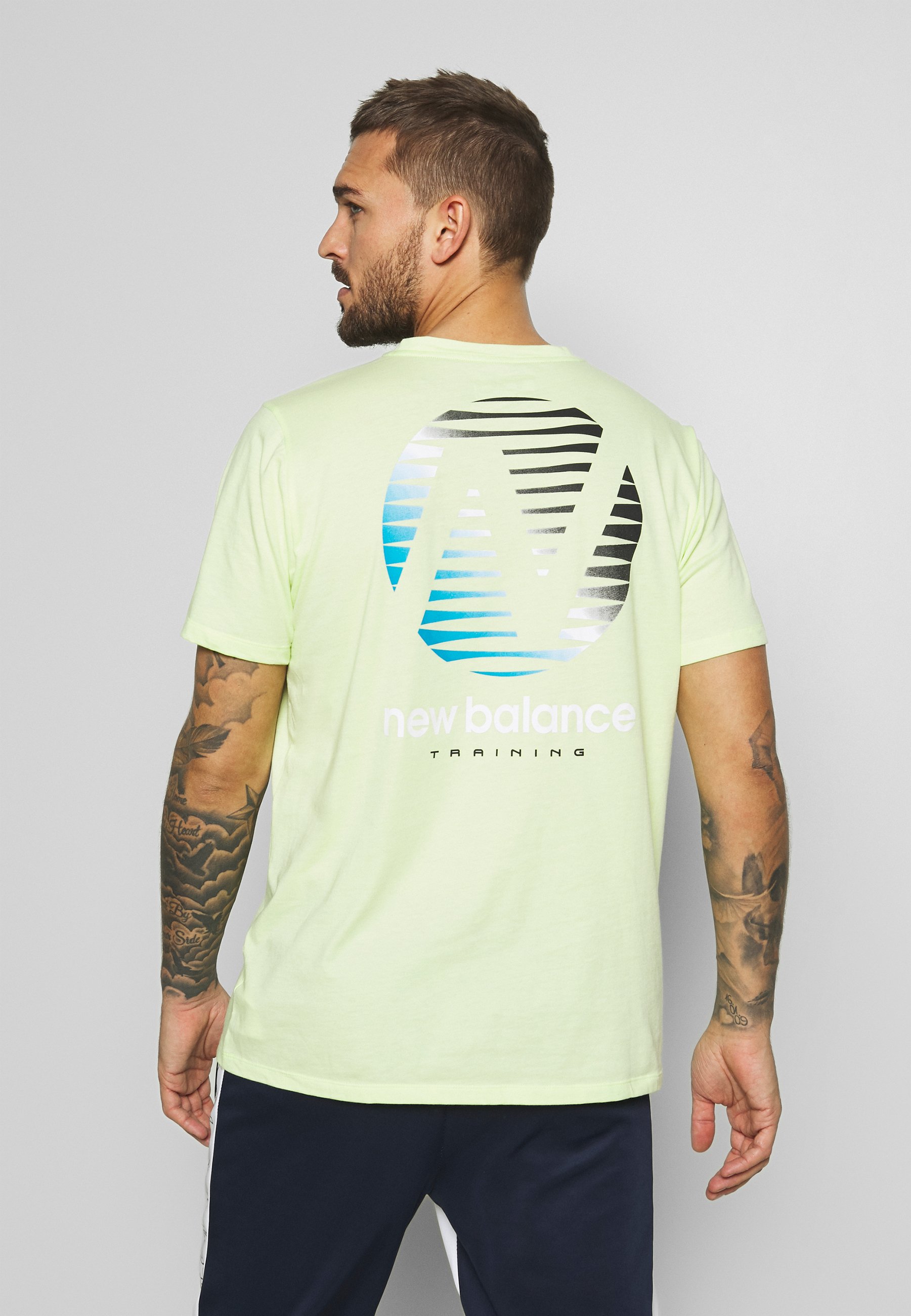 New Balance GRAPHIC HEATHERTECH - T-shirt con stampa - neon green/verde fluo  - Zalando.it