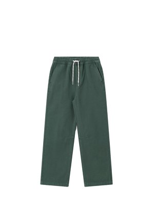 Green casual pants with elastic waistband and white drawstring, featuring angled side pockets and straight leg cut.