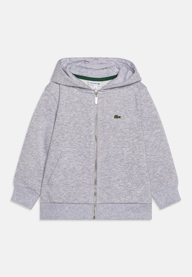 Sweat à capuche zippé gris clair, avec poignets et bas côtelés, poches avant et petit logo crocodile vert sur la poitrine.