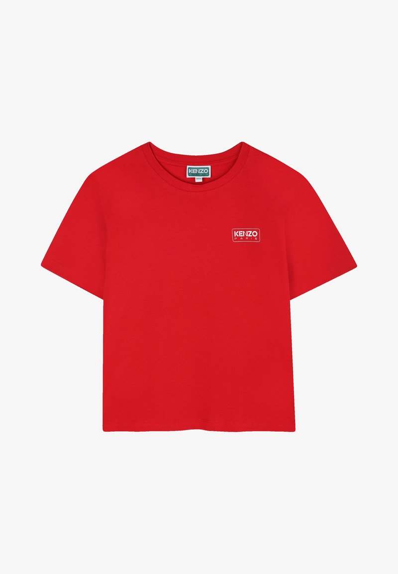 Rode katoenen t-shirt met een ronde hals en korte mouwen. Heeft een klein wit logo-label met "KENZO PARIS" in de bovenhoek links.