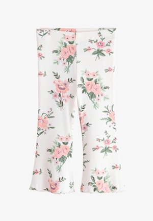 Bela rebrasta legica z rožnatim in vijoličastim vzorcem vrtnic, zelenimi listi ter valovitim spodnjim robom.