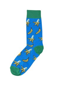 Blå sokker med en grøn manchet, der har gentagne banana mønstre. Lavet af et blødt materiale, de har en glat tekstur og kontrasterende detaljer.