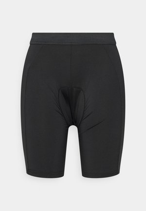 Black padded cycling shorts with elastic waistband and stitching details, designed for comfort and performance during biking.
