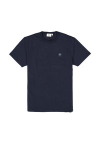Camiseta azul marino hecha de tela texturizada, con cuello redondo y un pequeño parche de logo en el pecho. Mangas cortas y rectas.