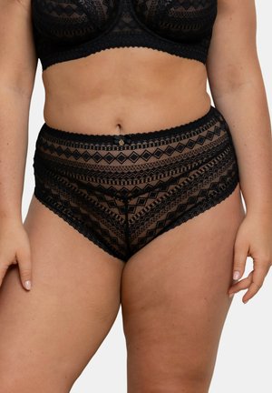 Culotte taille haute en dentelle noire, ornée de motifs géométriques, de bords festonnés et d'un petit nœud décoratif au centre avant.