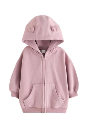Jasnoróżowa dziecięca bluza rozpinana na zamek z przednimi kieszeniami i małymi materiałowymi uszami na kapturze, wykonana z miękkiego materiału polarowego.