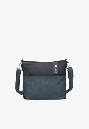 Compact crossbody bag in two-tone dark blue with adjustable strap, zipper closure, and small brand logo on the upper front.