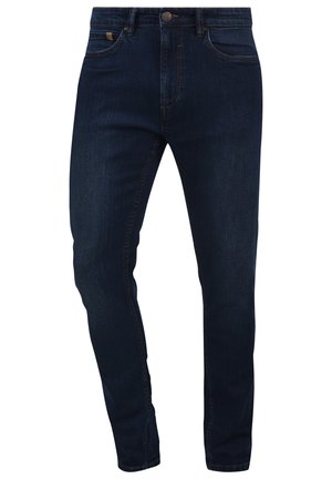 Dunkelblaue Jeans aus Denim mit schlanker Passform, fünf Taschen und subtilen Nähten. Mit einem Metallknopf und Gürtelschlaufen an der Taille.