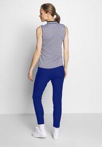 Kjus WOMEN IKALA 7/8 TREGGINGS - Nohavice - atlanta blue