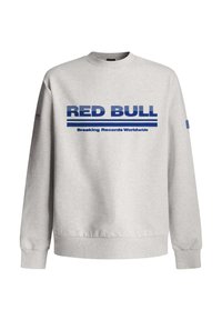 Sweatshirt gris en mélange de coton. Présente un logo "RED BULL" bleu et le texte "Breaking Records Worldwide" sur la poitrine. Col rond, manches longues.