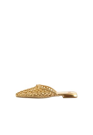 Flat slip-on mule with woven gold metallic upper and a small square heel, showcasing detailed braided texture and a knot accent on top.