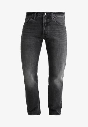 Tmavě modré džínové kalhoty s kuželovitým střihem, zdobené efektem ošoupání, s pětikapsovým designem a kovovým knoflíkem u pasu.