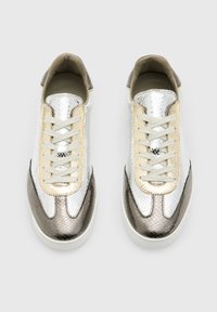 Metallic sneakers with a textured silver upper, gold accents, and gray detailing. Features laces and a smooth inner lining.